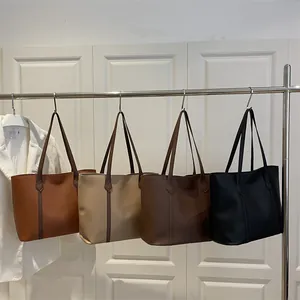 Minimalist color-block tote bag in four shades with vertical stripes and long handles