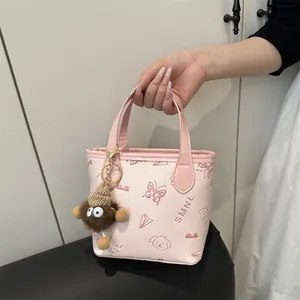 Women PU Leather Embossed Bucket Shoulder Bag With Plush Monster Keychain Small Cartoon Pattern Crossbody Handbag Fashion Bag