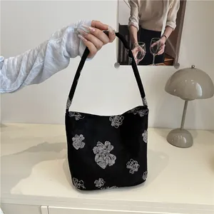 Sac fourre-tout élégant en toile noire avec motif floral blanc de style chinois