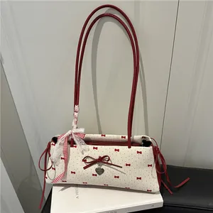 Dames Zoete Strik Gestippelde Okseltas PU Leer Schoudertas Met Metalen Hart Hanger Schattige Mode Tote Bag