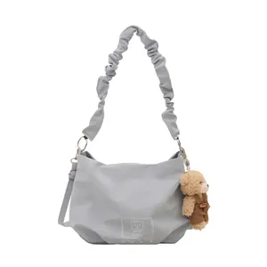 Cute light blue cloud shoulder bag with bear pendant and printed daily greeting