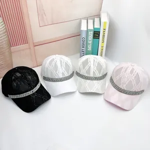 Lace floral baseball caps with rhinestone trim for women in black white and pink