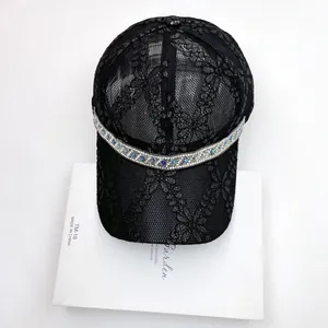 Breathable black lace baseball cap for women with elegant floral patterns and blue rhinestones