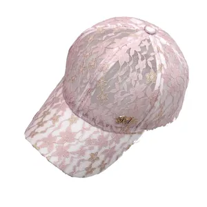 Stylish pink lace baseball cap with gold floral patterns and rhinestone M letter logo