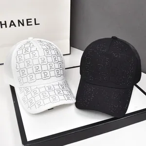 Fashion baseball caps with rhinestone letter patterns and breathable mesh in black and white