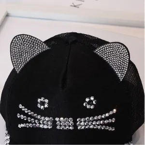 Detail of black baseball cap with rhinestone cat ears and breathable mesh back