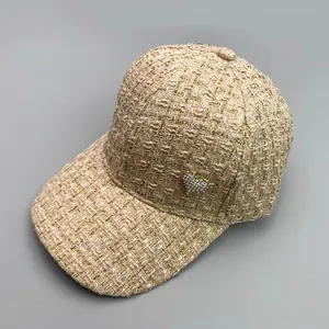 Fashionable beige tweed baseball cap for women with glittering metallic gold threads