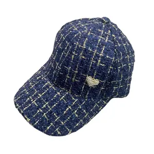 Deep blue tweed baseball cap for women with gold thread and pearl heart detail
