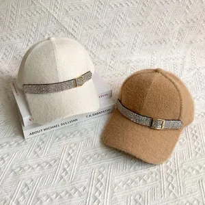 Stylish plush baseball caps in beige and camel with rhinestone buckle decoration
