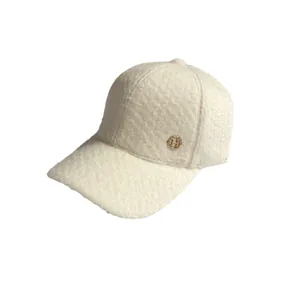 Winter faux shearling baseball cap in cream with gold H-logo metal hardware