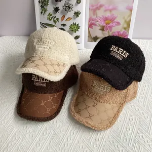 Detail of four lamb wool baseball hats in white, brown, black and khaki with PARIS embroidery