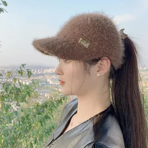 Close-up of coffee brown mohair open top baseball cap with fuzzy plush texture