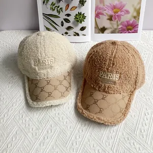 Sherpa fleece baseball hats with Paris embroidery and R-logo brim in cream and camel