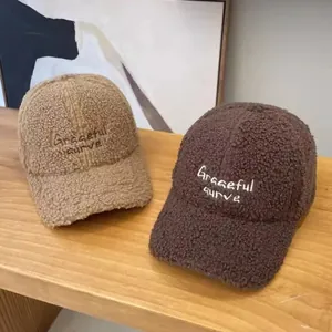 Plush lamb wool baseball caps in camel and brown with Graceful curve embroidery