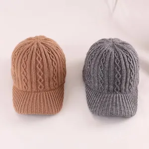 Women's autumn winter knit baseball caps in brown and grey with cable knit pattern
