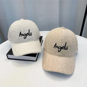 Winter teddy velvet baseball caps in beige and khaki with Angels embroidery