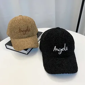 Teddy fleece baseball caps in black and brown featuring embroidered Angels lettering