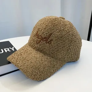Close-up of Angels embroidery and textured brown teddy fleece on baseball cap