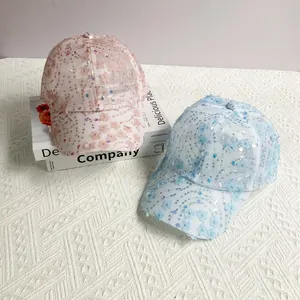 Floral mesh baseball caps in pink and blue featuring sequins and 3D plum blossom appliques