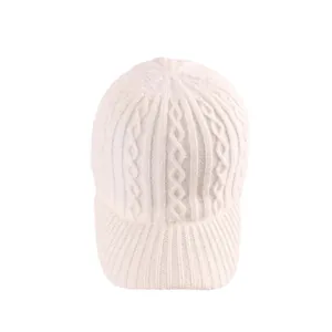 White cable knit baseball cap for women with classic pattern and warm winter texture