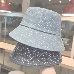 Denim bucket hats with sparkling rhinestones in light blue and dark grey denim fabric