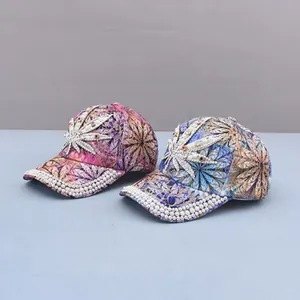 Fashion baseball cap featuring rhinestone maple leaf design and pearl edge decoration