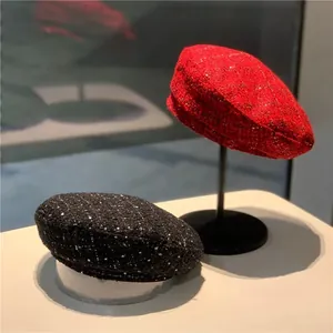 Classic tweed beret hats for women in red and black with metallic thread texture