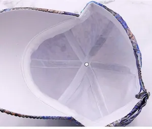 Detailed view of baseball cap interior with white reinforced seams and adjustable metal buckle