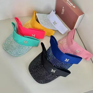 Multi-color open top sun visors with rhinestone brims and metallic M logo detail