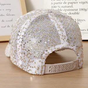 Detail of white sequin baseball cap with mesh fabric and adjustable snapback strap