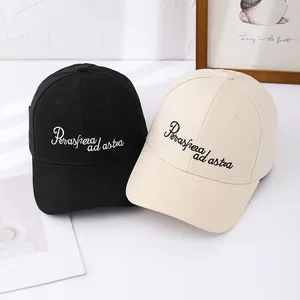 Black and beige baseball caps with Per aspera ad astra embroidery on a white background