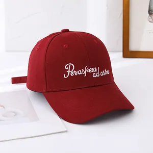 Classic burgundy baseball cap featuring white Peraspera ad astra embroidery on front