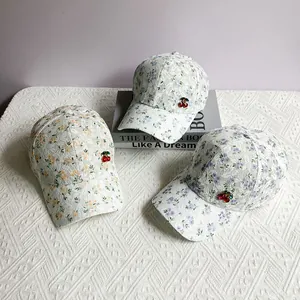 Floral lace baseball caps with cherry accents in yellow, blue and purple pastel colors