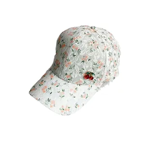 Women's white lace baseball cap with floral print and decorative cherry ornament