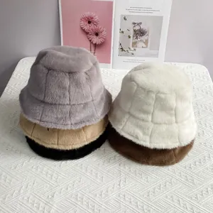 Plush faux mink fur bucket hats in five colors featuring textured checkered patterns