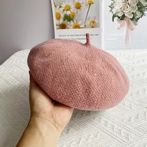 Detailed knit texture of pink chenille beret hat featuring subtle silver sequins