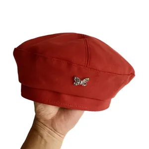 Red wool beret hat for women with a delicate silver metal butterfly ornament