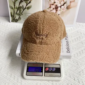 Lamb wool baseball cap with 'Variety 1708' embroidery showing weight of 108g on a scale