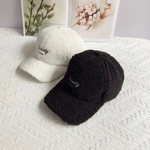 Winter lamb wool baseball caps in black and white with embroidered Vaivety 1788 logo