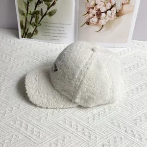 Detailed view of white fleece baseball cap featuring high-quality lovely embroidery texture