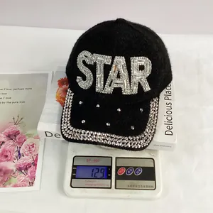 Detail shot of black faux mink fur baseball cap weighing 129g with STAR rhinestone logo