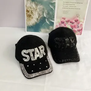 Furry black baseball cap featuring sparkling STAR rhinestone embellishments on the front