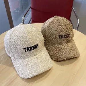 Teddy fleece baseball caps with TRENDY embroidery in beige and brown colors