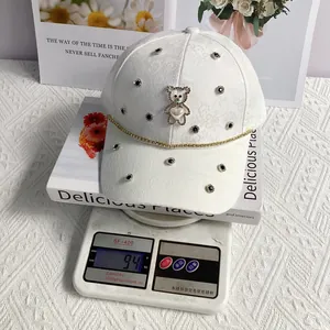 Detailed view of lightweight jacquard iris baseball cap weighing 94g with rhinestones