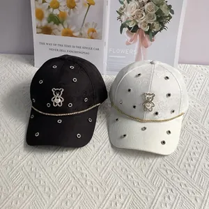 Black and white floral jacquard baseball caps with rhinestone bear and chain decoration