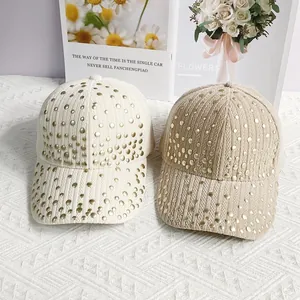 Corduroy baseball caps with gold rivets in beige and camel colors for autumn