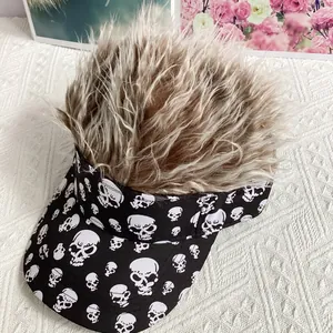 Close-up of baseball cap with skull patterns and brown wig hair on top for Halloween