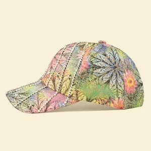 Detail of printed baseball cap with silver star rivets and woven stripes on fabric