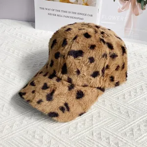 Detailed view of the leopard print plush texture on this winter baseball cap for women