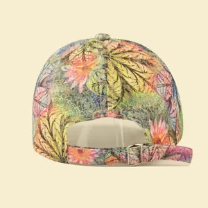 Detail of colorful tropical floral print baseball cap with adjustable metal back buckle